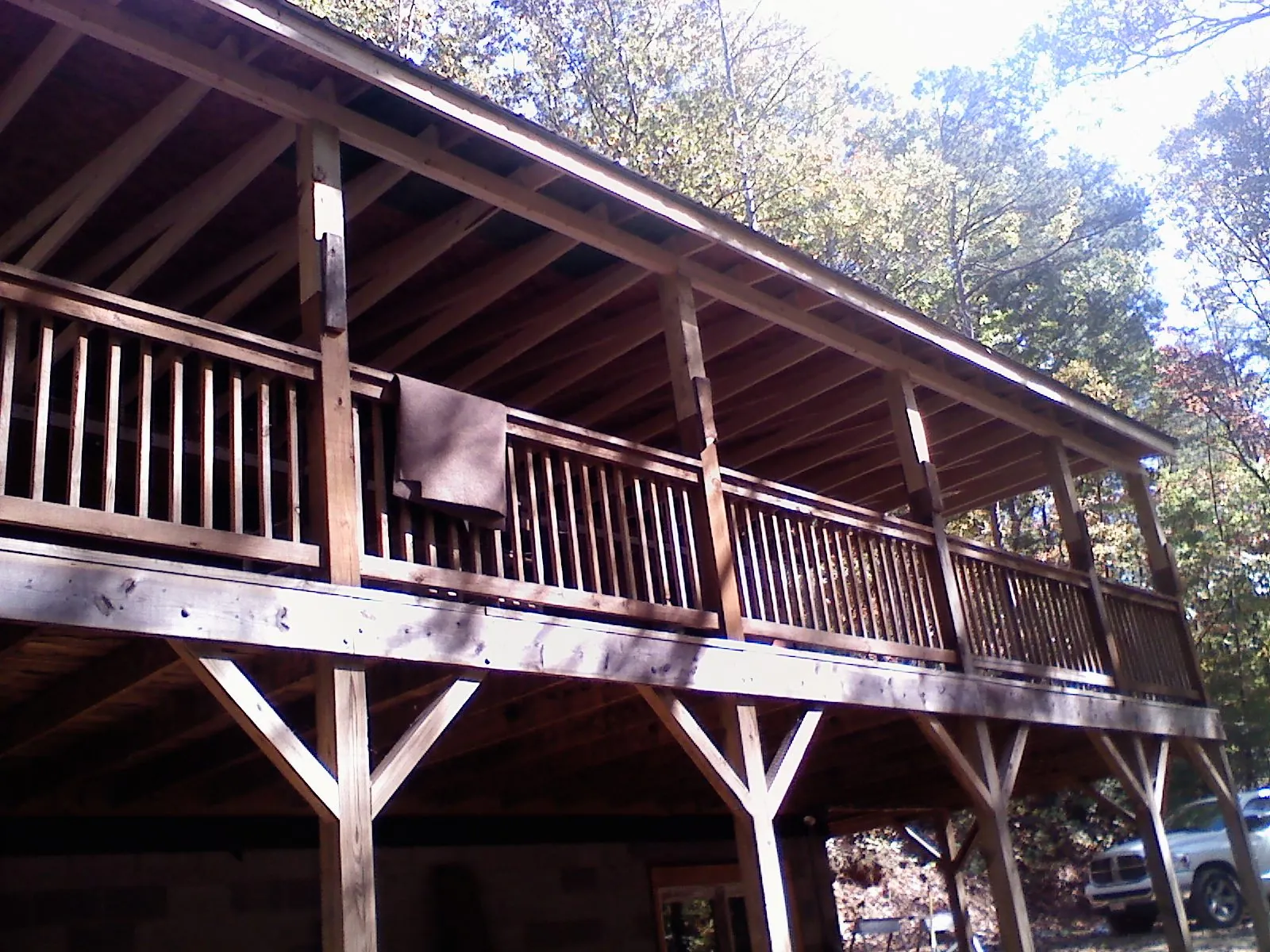 Timber framing under a new elevated porch and deck — Roof Leak Repair in Otsego by Roofing Brothers